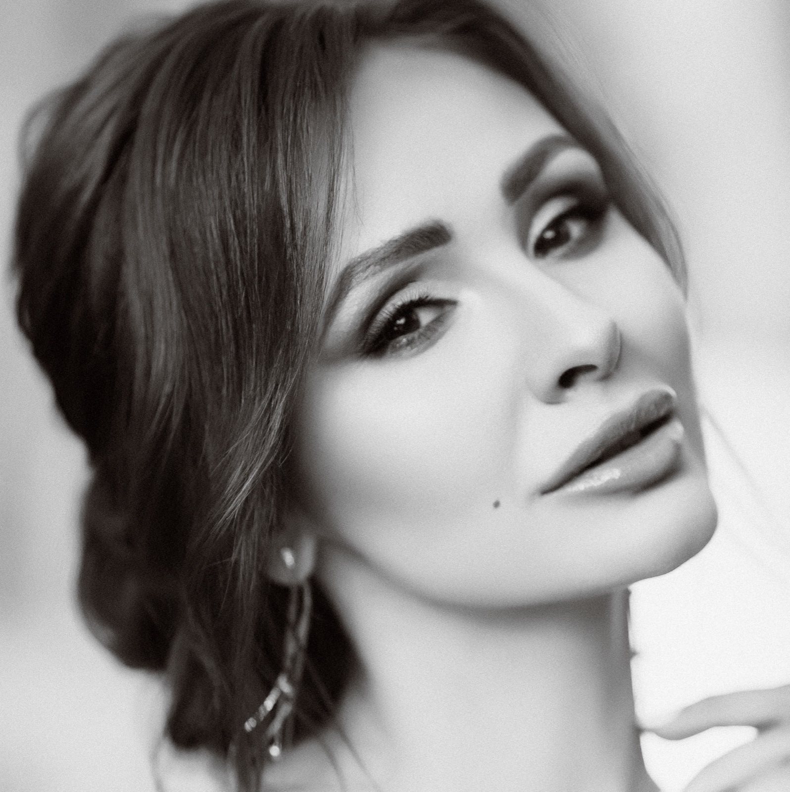 Elegant bridal makeup with a polished updo for a wedding day